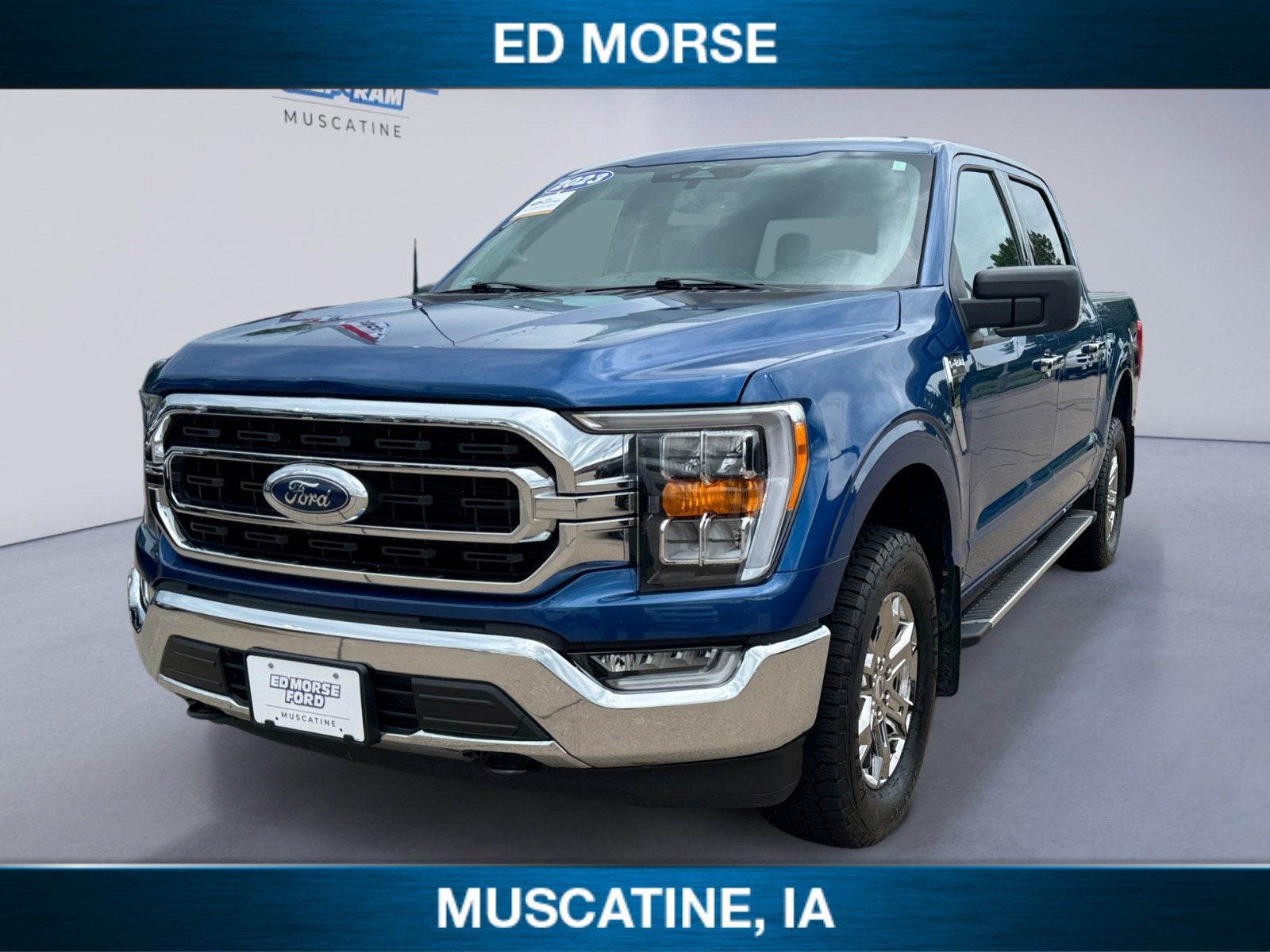 2023 Ford F-150 XLT in Blue Metallic — front three-quarter view
